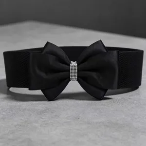Black elastic wide belt featuring a satin bow and sparkly rhinestone center buckle for dresses.