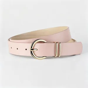 Detailed view of a chic pink PU leather belt featuring a shiny gold round pin buckle and double loops.