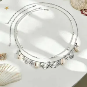 Bohemian multi-layer beach waist chain with starfish seashell pendants and beads fashion jewelry.
