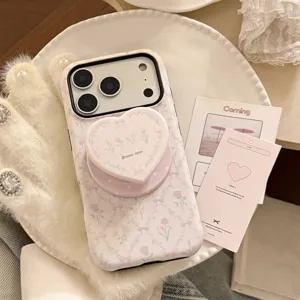Elegant French style pink floral phone case with heart-shaped grip for iPhone models