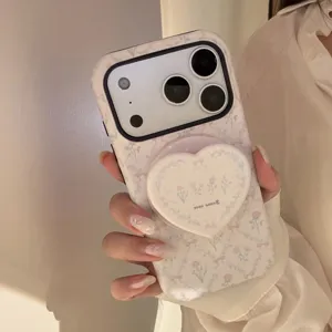 French style pink floral iPhone case with heart grip detail macro view