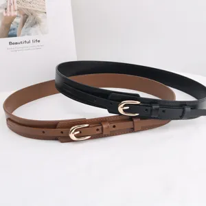 Detail view of men PU leather belt with metal pin buckle, classic black and brown colors.