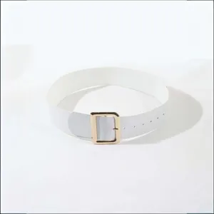 Close-up detail view of white crocodile pattern wide belt featuring stylish gold square buckle.