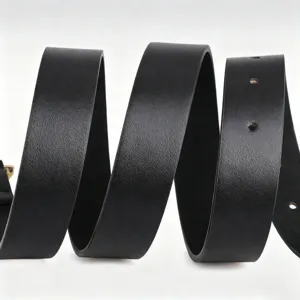Minimalist black leather belt detail, classic retro pin buckle women trouser accessory.