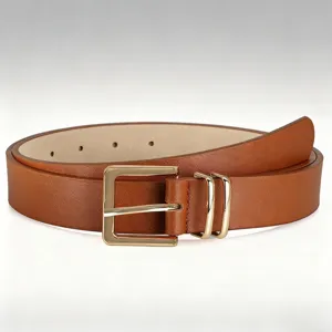 Detailed close-up of brown leather belt with gold square buckle and dual metal loops.