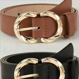 Detailed close-up of wide women's leather belt with stylish metal buckle in black and brown.
