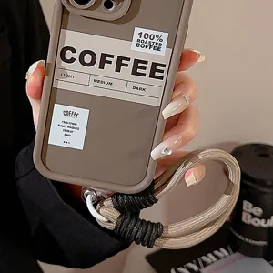 Détail d'une dragonne de téléphone tressée beige et noire durable avec thème café