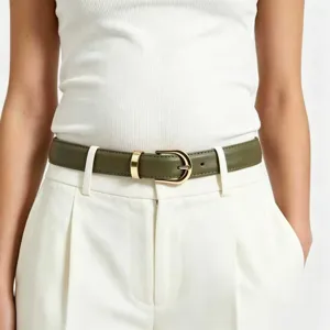 Green PU leather thin belt detail with gold metal buckle, elegant women trouser accessory.