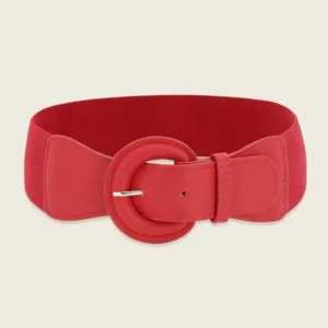 Detailed shot of a stylish red wide elastic waist belt with a matching round buckle.