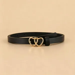 Women black PU leather belt with gold double heart buckle, fashionable waist accessory.
