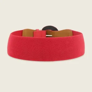Detailed view of a wide red elastic belt featuring a textured woven pattern for women.