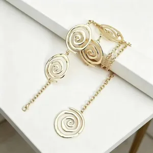 Gold metal waist chain with stylish spiral circle design, sweet cool fashion accessory for women.