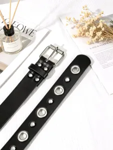 Punk style black leather belt with metal eyelets and studs, detailed close-up view.