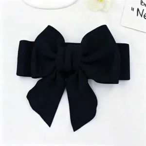 Detailed view of a large black fabric bow on a high-elastic waist cincher belt for dresses.