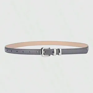 Detailed shot of a sleek grey thin leather belt featuring a polished silver-tone buckle.