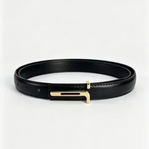 Minimalist women's black leather belt with gold tone T buckle for chic daily wear.