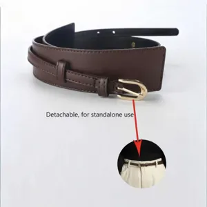 Detailed view of brown wide leather belt with golden buckle and detachable slim strap design.