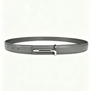 Women's minimalist gray leather belt with unique silver metal buckle for dress pants.