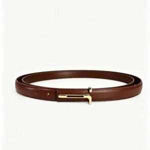 Minimalist brown leather belt with gold metal buckle detail, elegant accessory for dress.