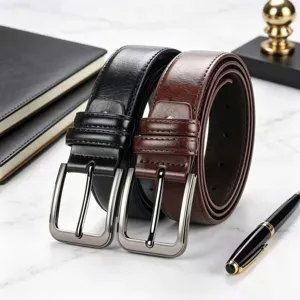Detailed view of classic men's pin buckle leather belt showcasing black and brown dual color style.