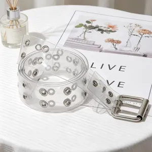 Clear PVC belt detail showing double-row metal eyelets and double-prong buckle design.