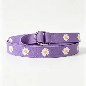 Purple canvas belt featuring white daisy embroidery and silver double D-ring metal buckle.