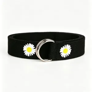 Black canvas belt for women with cute daisy embroidery and shiny double D-ring metal buckle.
