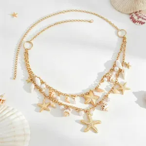 Bohemian gold multi-layer waist chain with starfish and shell details, perfect for beach.