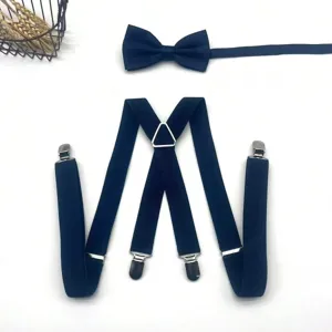 Men navy blue suspender bow tie set Y-back elastic braces with metal clips detail.