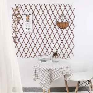 Wooden expandable trellis fence for indoor and outdoor garden wall decoration, brown wood.