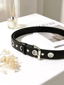 Punk style black leather belt with metal eyelets and silver buckle for women daily wear