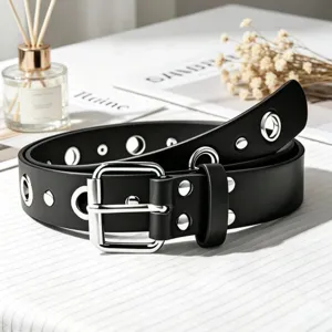 Punk style black grommet belt with silver square buckle, versatile metal eyelet waist strap for women.