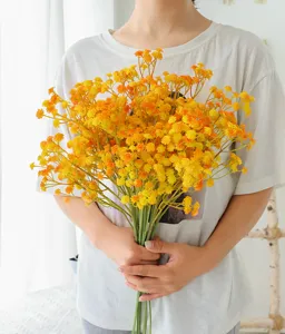 Artificial baby's breath bouquet yellow faux flowers for home living room wedding decoration.