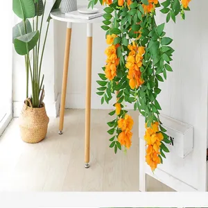 Vite di glicine artificiale appesa arancione vibrante per elegante decorazione d'interni