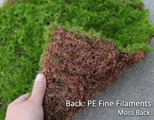 A close-up view showing the durable PE filament backing of this artificial moss mat turf