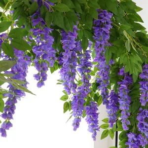 Hanging purple artificial wisteria vine flowers with green leaves for ceiling decoration