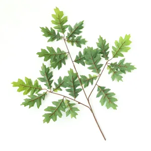 Artificial oak leaf branch green plastic plant fake tree branch for home decor staging.