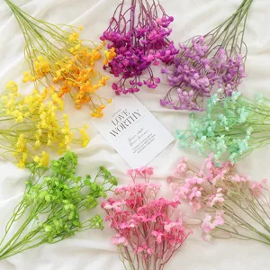 Colorful artificial baby's breath flowers bouquet for home wedding party decor and floral arrangement.