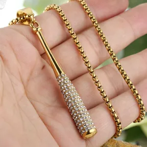 Close-up of gold titanium steel baseball bat pendant necklace with micro-pave crystals
