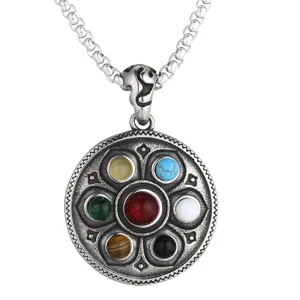 Close-up of retro titanium steel lotus pendant with seven colorful stones
