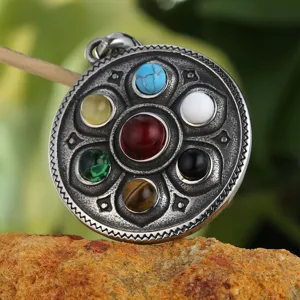Vintage titanium steel lotus pendant featuring seven colorful natural style stones.