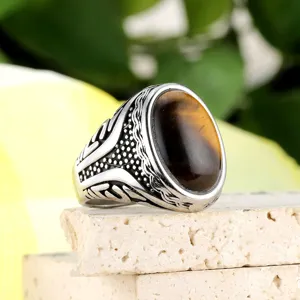 Vintage titanium steel ring with large oval tiger eye gemstone and rune carvings