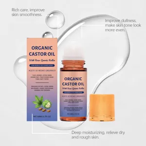 Detailed view of Organic Castor Oil bottle and box with rose quartz roller applicator.