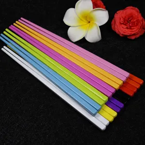 Macro view of colorful candy-colored melamine chopsticks for children, 18cm length.