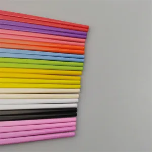 Colorful melamine children chopsticks detail shot, displaying various bright shades and smooth finish.