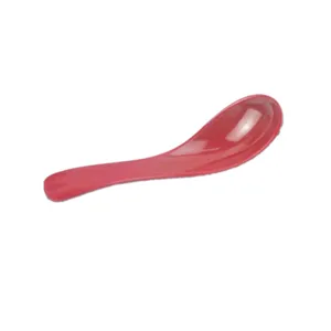Red melamine soup spoon detail view, durable plastic tableware, smooth polished surface.