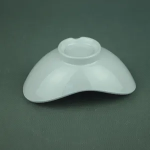 Bottom view of white melamine irregular yuanbao bowl showing embossed details