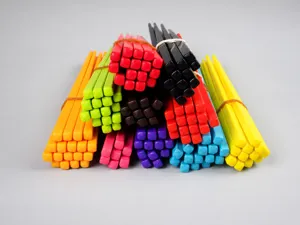 Detailed view of assorted colorful 18cm melamine children's chopsticks in vibrant candy colors.