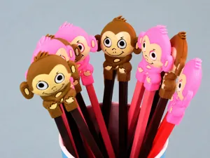 Detailed view of children's 18cm melamine chopsticks with cute cartoon monkey heads