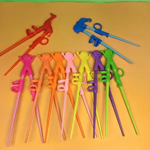Colorful silicone children training chopsticks set with cute animal tops for baby learning meal.